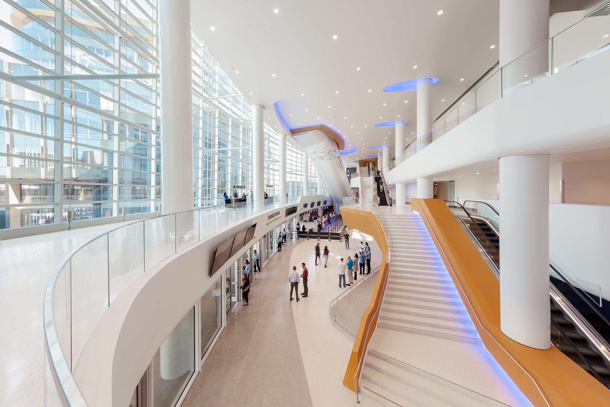 A long hallway with people.