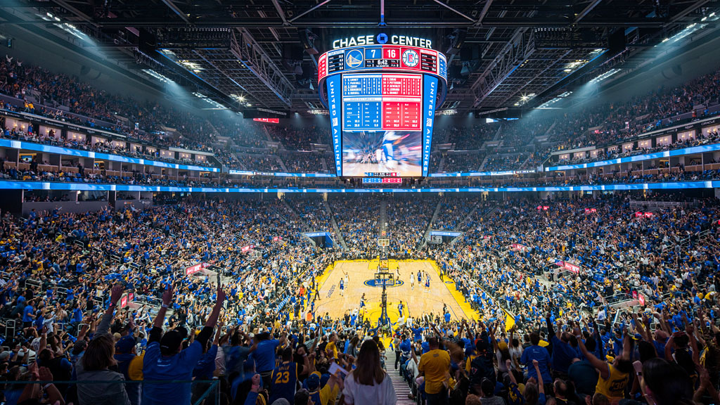 A crowd of people in a stadium.