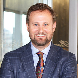 A man in a suit and tie.