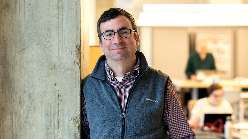 A man wearing glasses.