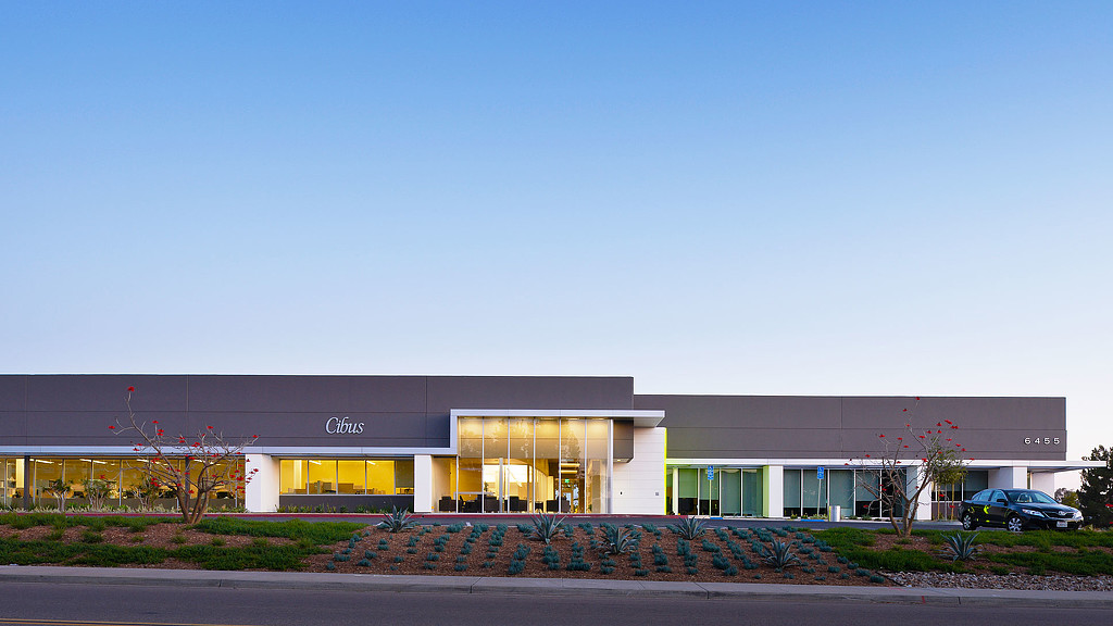 A building with a parking lot.