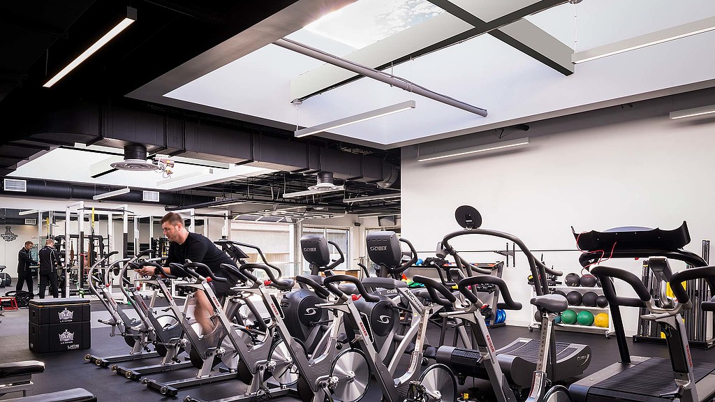A person working out in a gym.