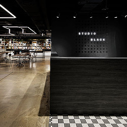 A room with tables and chairs.