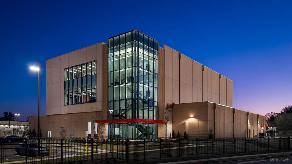 A large building with glass windows.