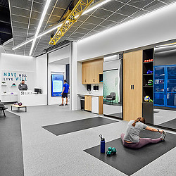 A person lying on the floor in a room with a person lying on the floor.