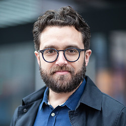 A man wearing glasses.