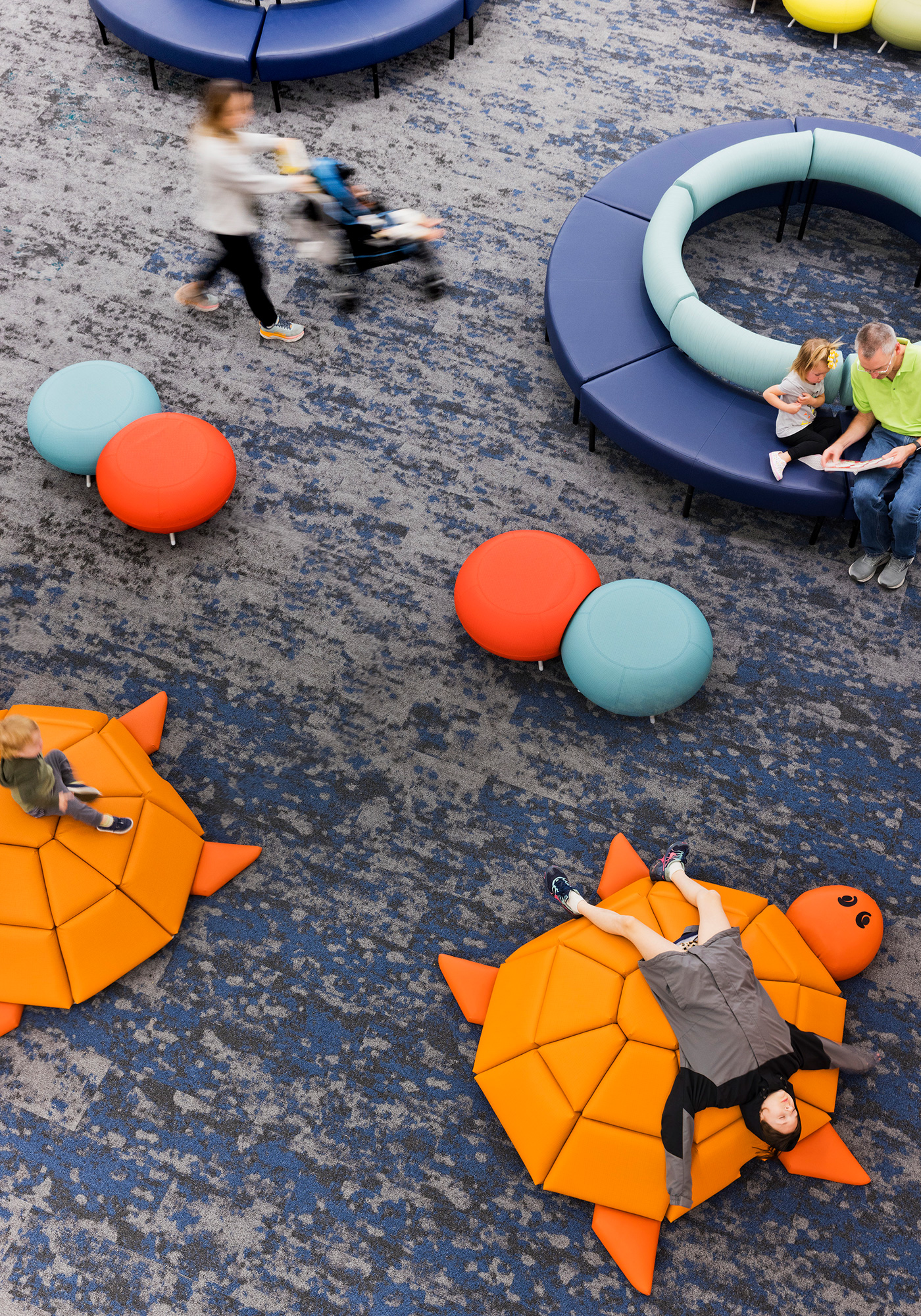 People playing with colorful balls.