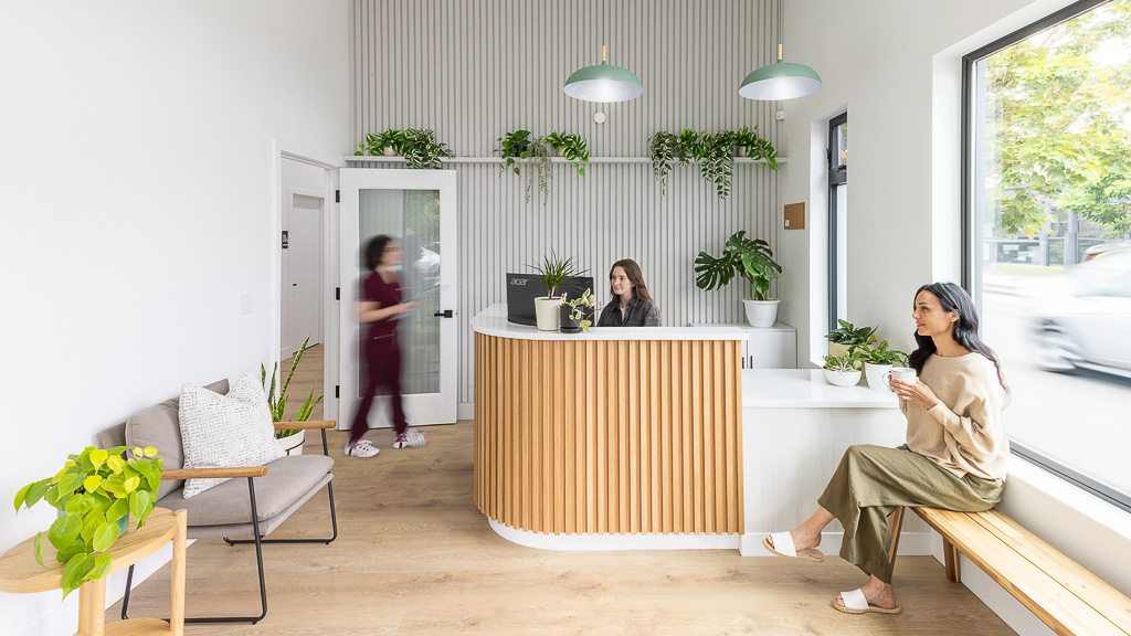 Open Wellness reception area with cozy seating