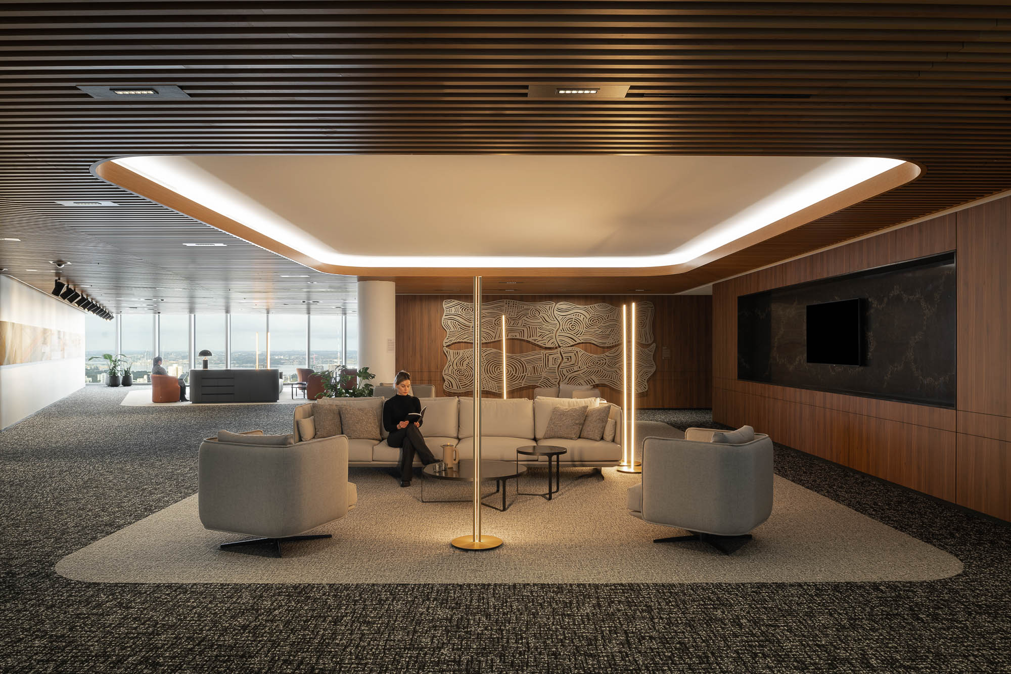 A person sitting on a couch at Chevron Perth workplace